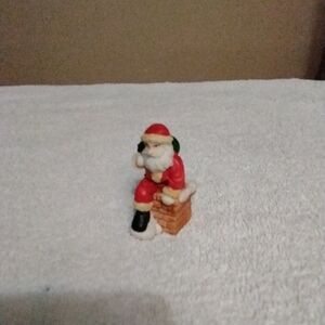 Santa Claus Figurine Going Down A Chimney - Red and White